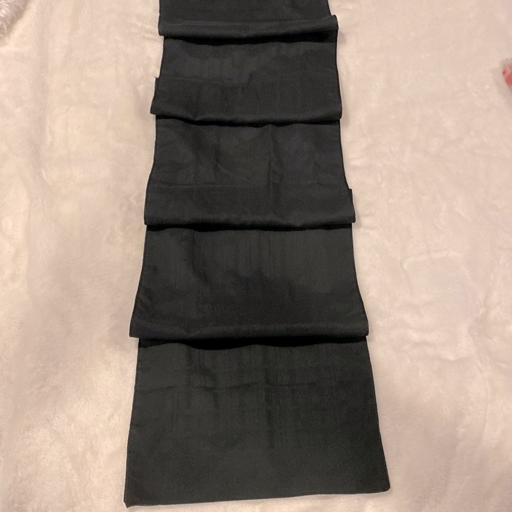 Woman’s black neck scarf